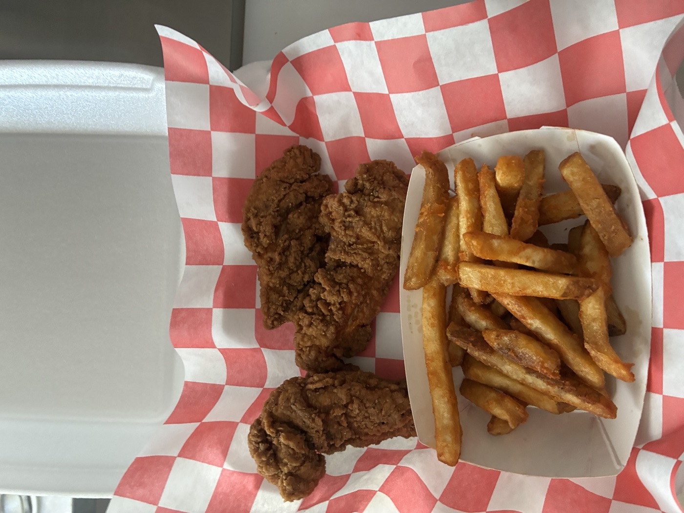 Chicken tenders basket — hand-breaded tenders with crinkle-cut fries