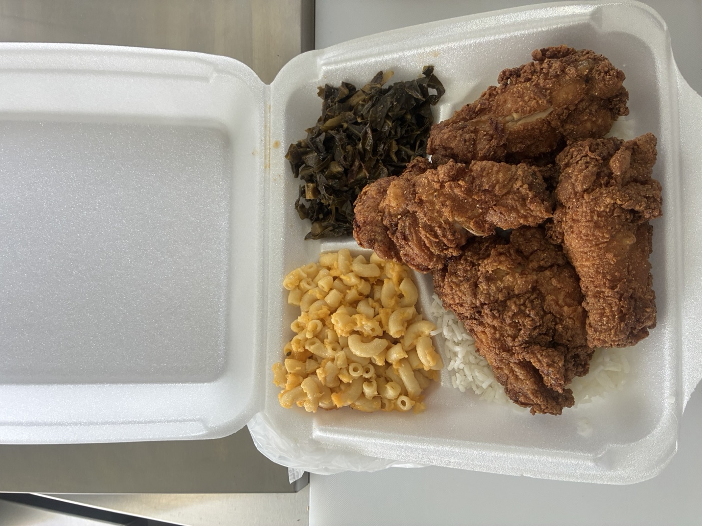 Fried Chicken Plate with collard greens, mac & cheese, and rice